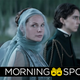 Dune's Rebecca Ferguson (Lady Jessica) wears a dressy blue gown with a see-through blue veil wrapped around her head while standing next to Timothée Chalamet's Paul Atreides in black military dress gear.